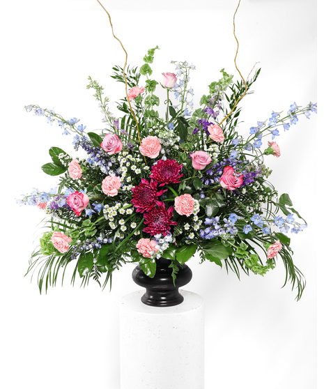 This beautiful mix of pastel flowers and greenery is a lovely reminder of your affection and respect for the dearly departed.