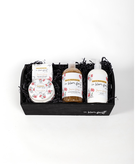 Our baskets include a mix of jasmine-hoeny scented soap, body wash, body lotion, and body butter. The deluxe and premium versions include a pink floral arrangement.