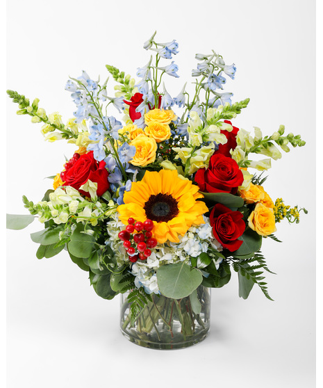 Vibrant and captivating, the Colorful Love arrangement bursts with colors and is a beautiful way to show your love to a friend, family member, or loved one.