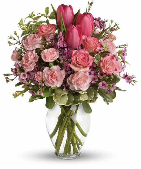 pink flower arrangement with roses, tulips, and carnations