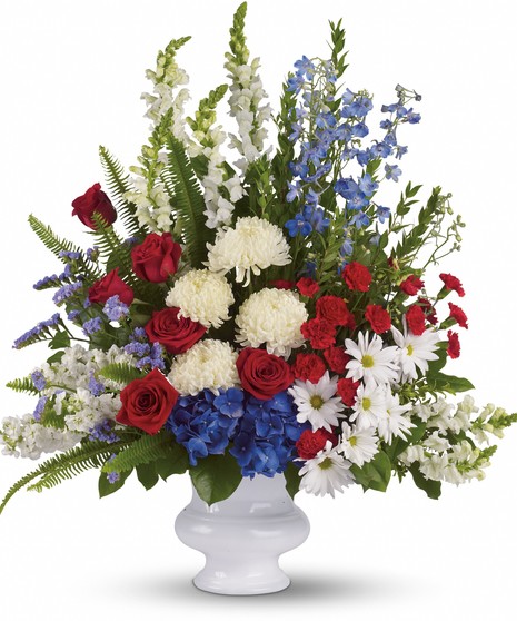 patriotic flowers in tall tribute urn