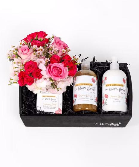 Our baskets include a mix of jasmine-hoeny scented soap, body wash, body lotion, and body butter. The deluxe and premium versions include a pink floral arrangement.